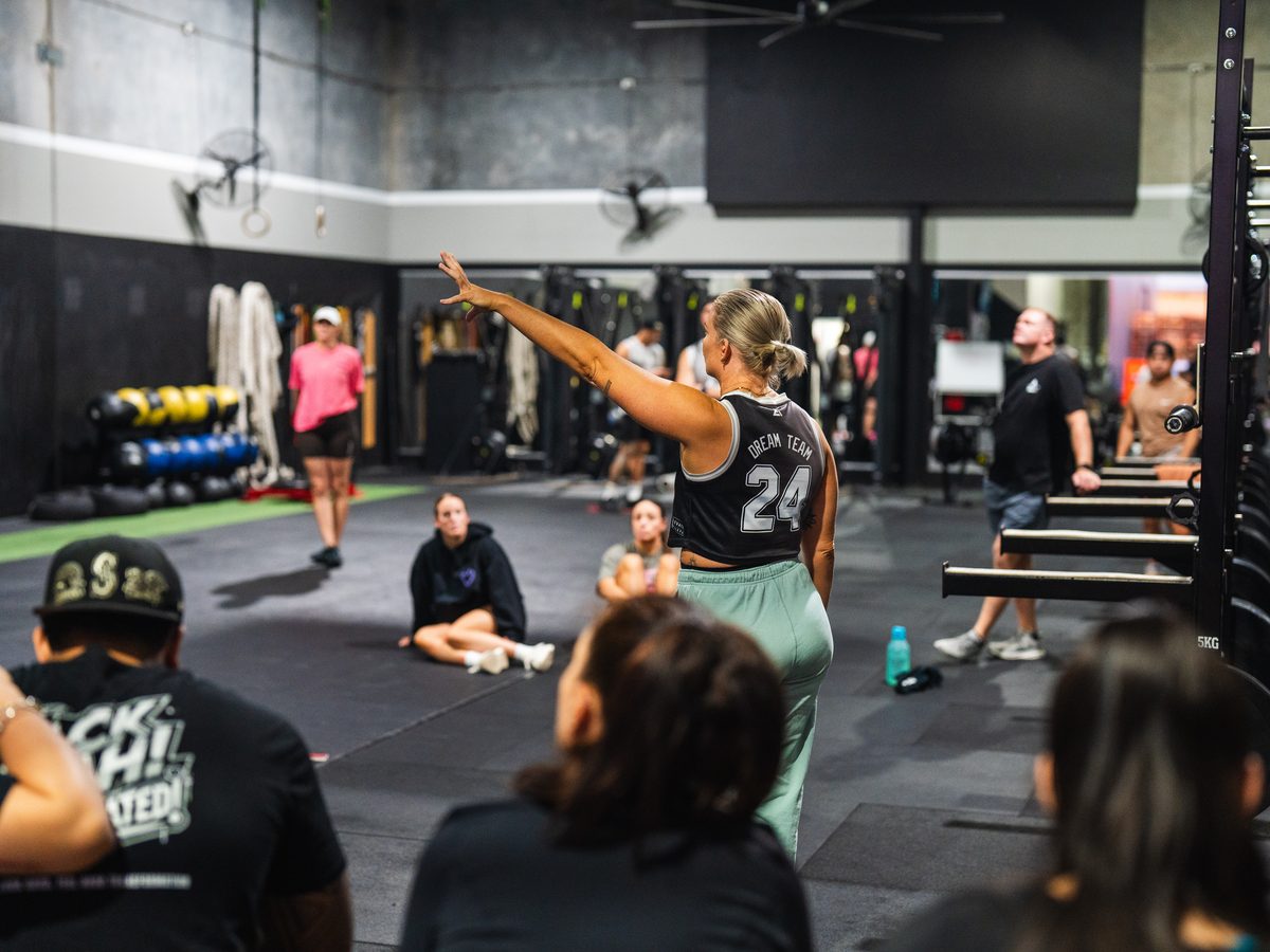 Trainer demonstrating a movement to the class