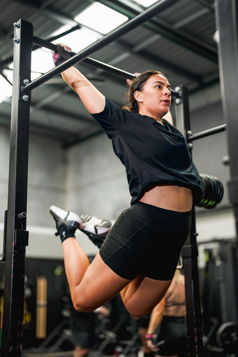 Member working through chin-ups on the rig